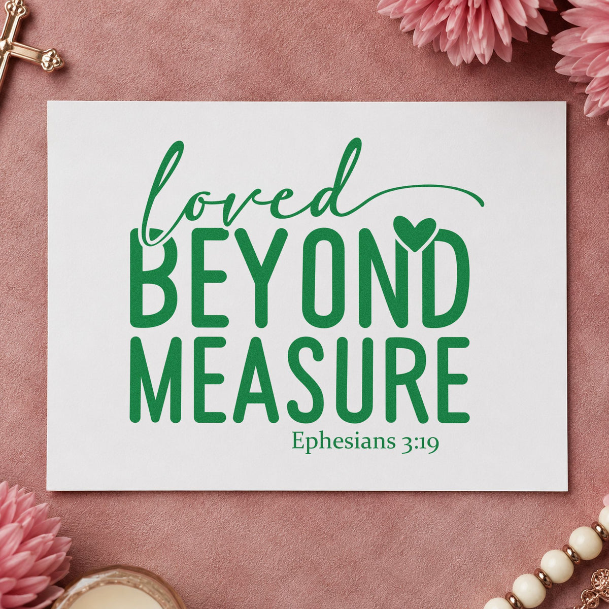 Loved Beyond Measure craft stamp imprint in green ink on a handmade project, one idea being anniversary gift tags.
