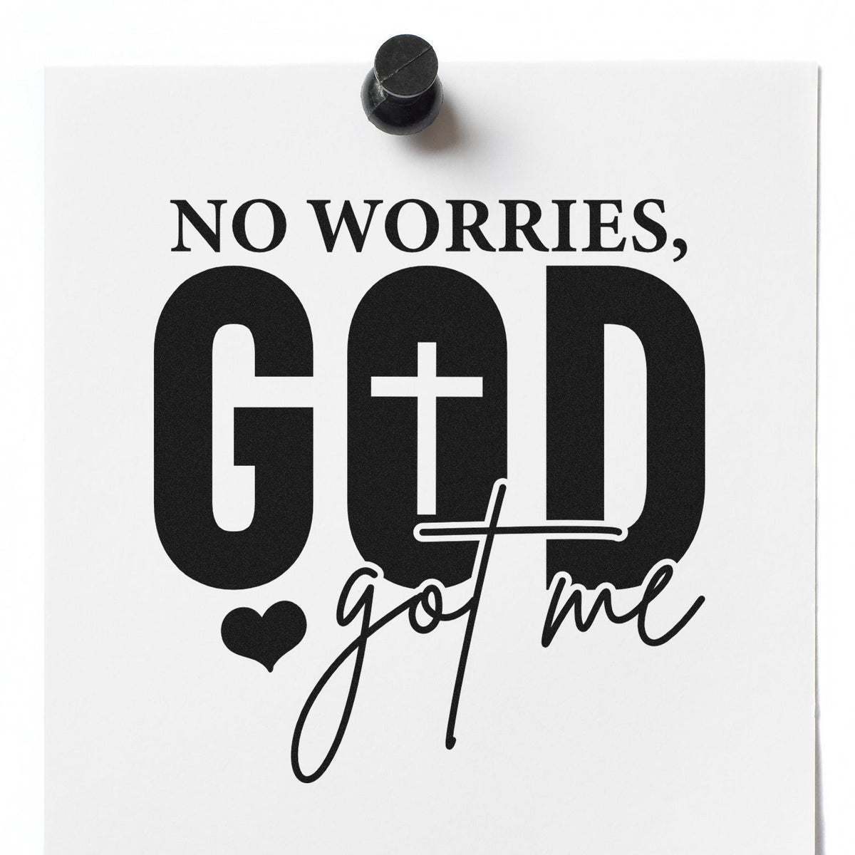 Black stamp seal reading No worries, God got me with cross and heart on white paper