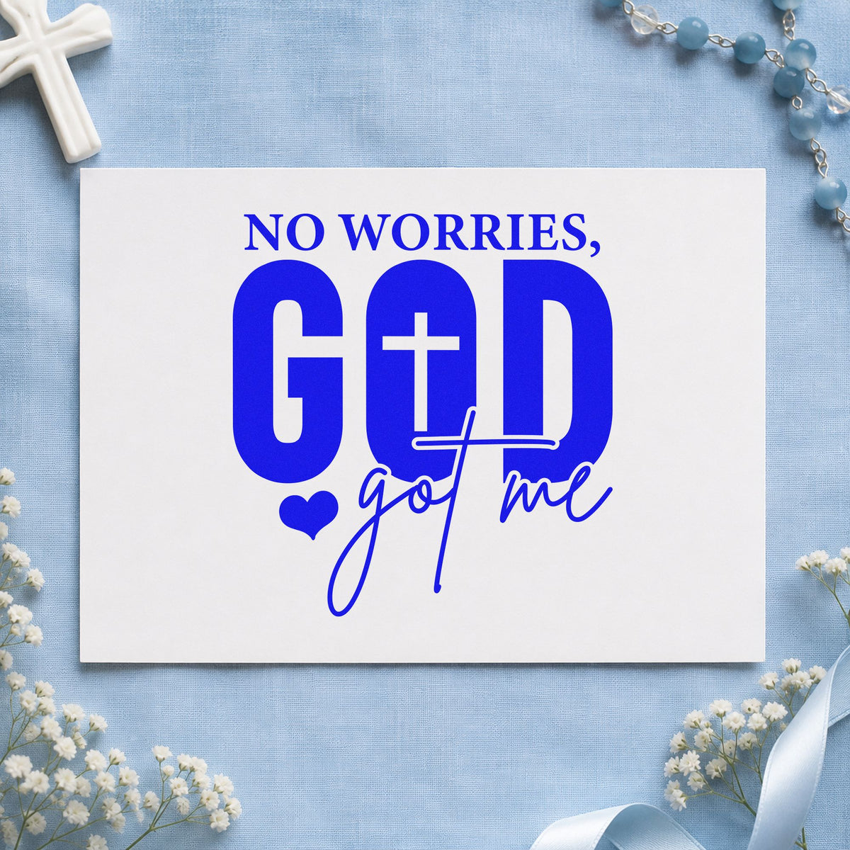 No Worries God Got Me craft stamp in blue ink on cardstock, an easy option for scrapbook calm pages.