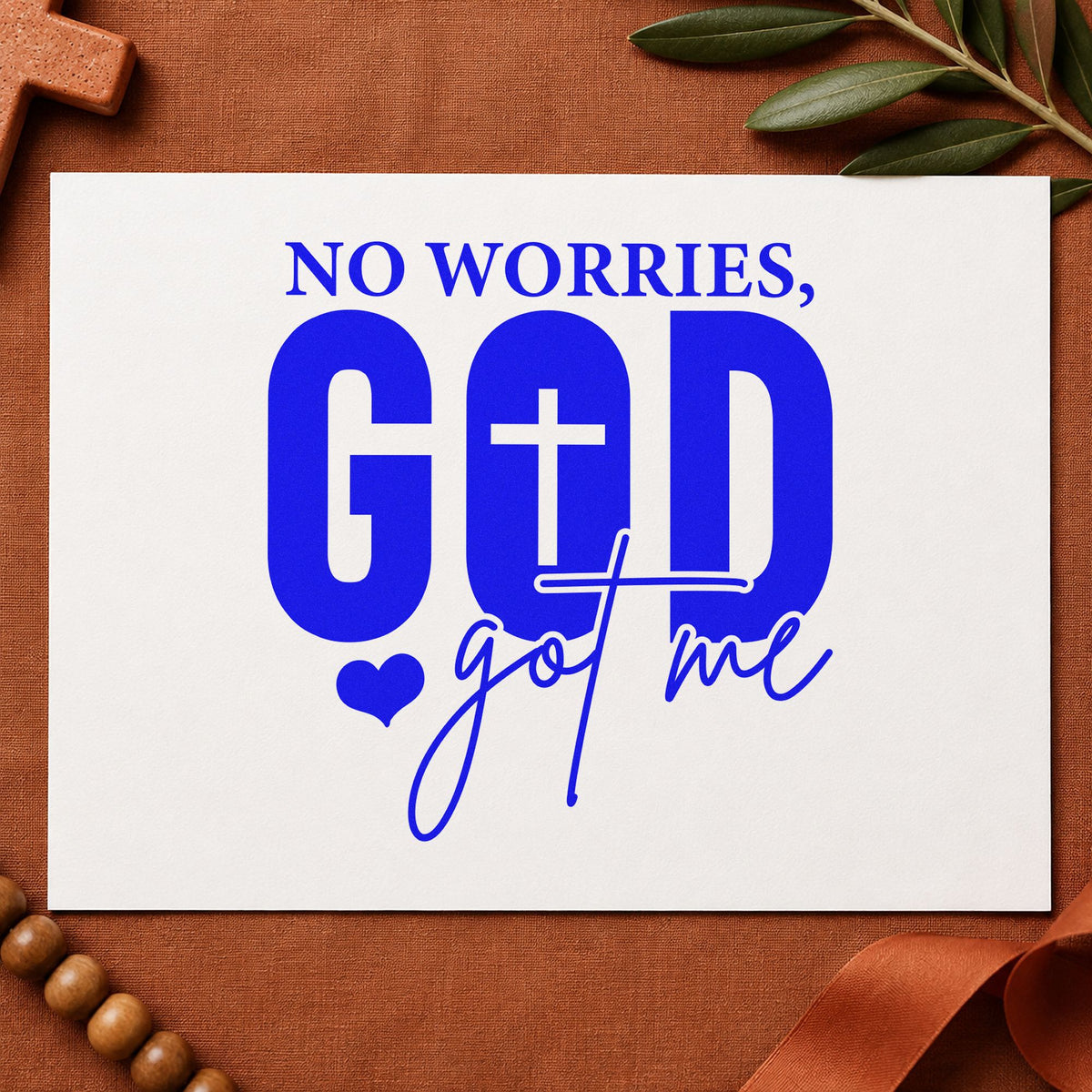 No Worries God Got Me craft stamp imprinted in blue ink on paper, a design suited to tee transfers.