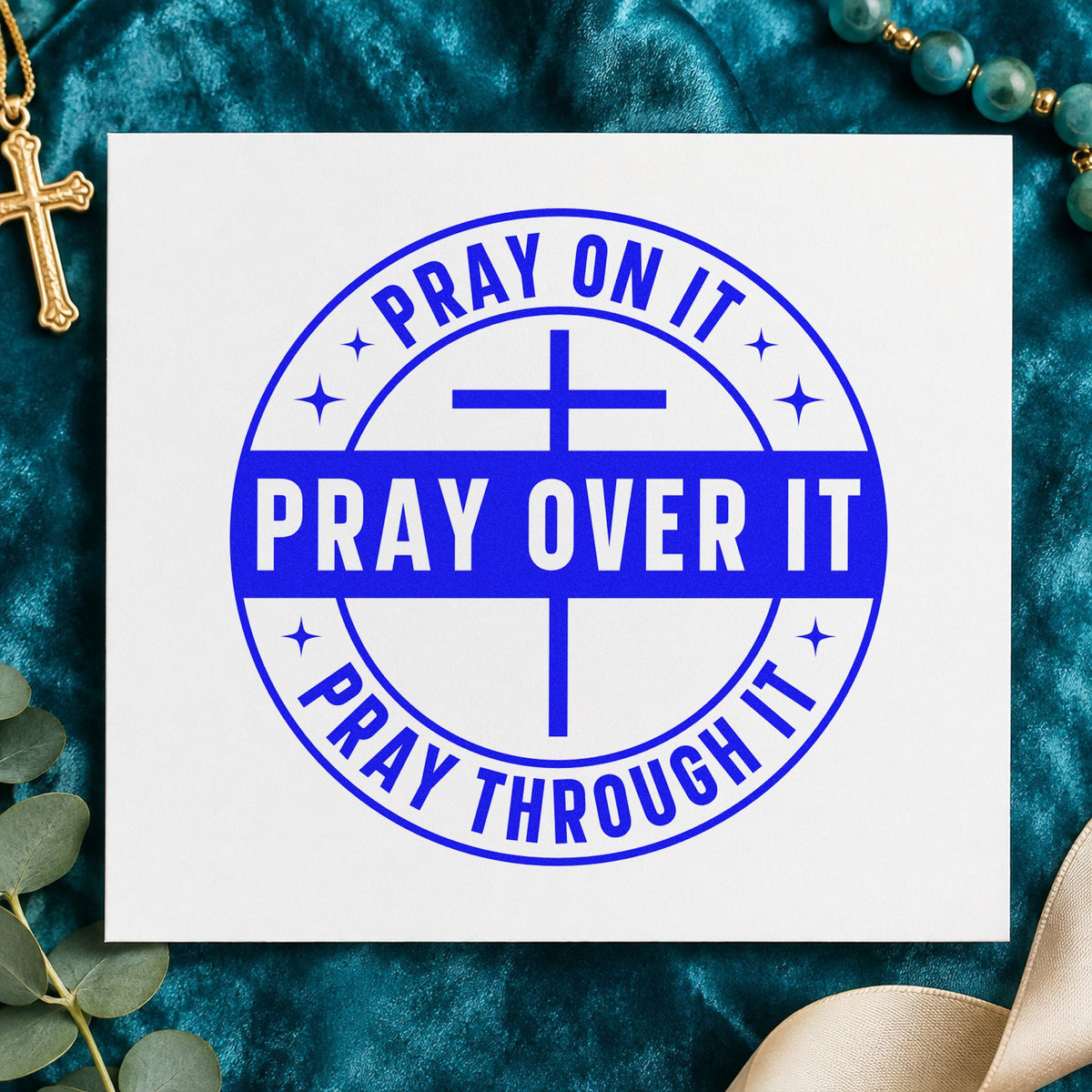 Pray on It Badge craft stamp in blue ink on cardstock, an easy option for canvas totes.