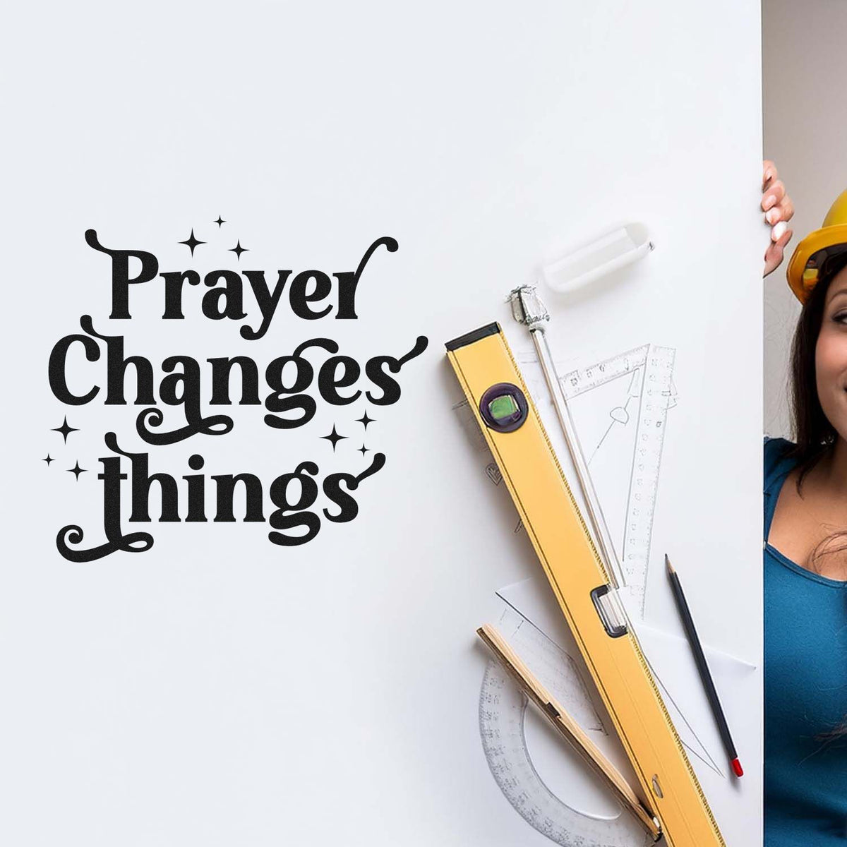 Black Prayer Changes things lettering on white board with yellow stamp and seal products, rulers, pencil.
