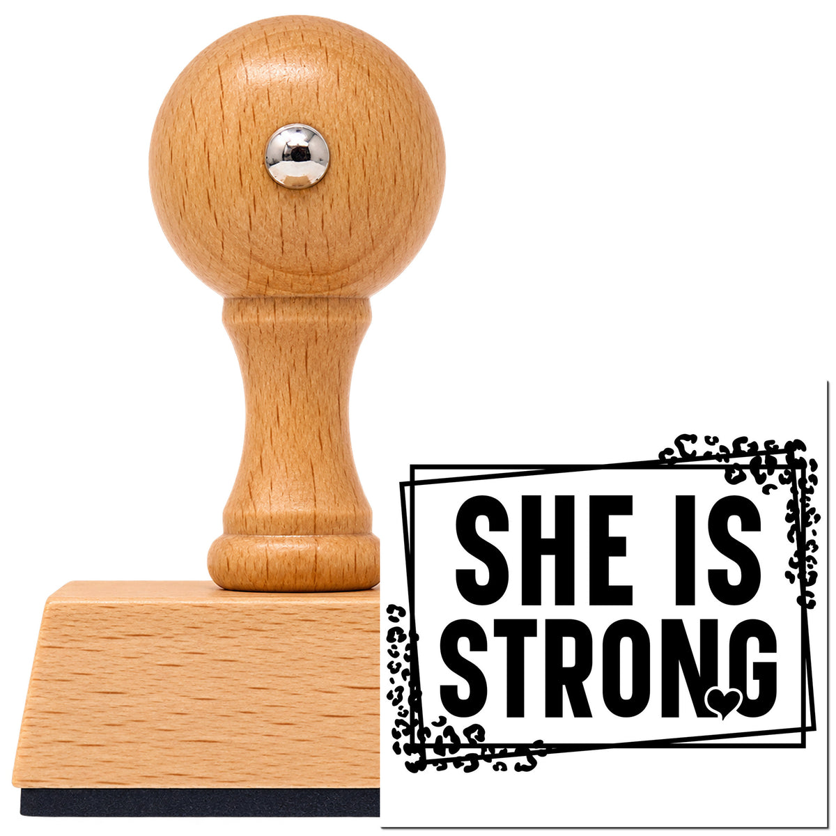 Vintage Pro beech wood stamp with a round knob handle, shown with its black She Is Strong Leaf Accents imprint on white.
