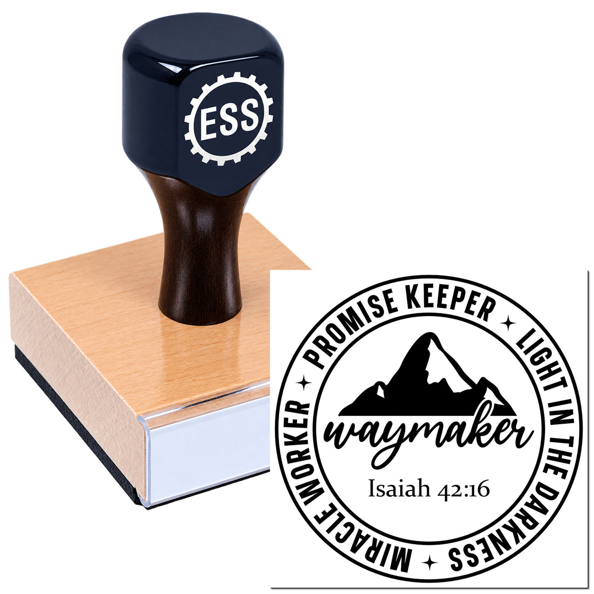 Dark navy custom stamp on wooden block with circular Promise Keeper seal, mountain graphic, and Isaiah 42:16 text.
