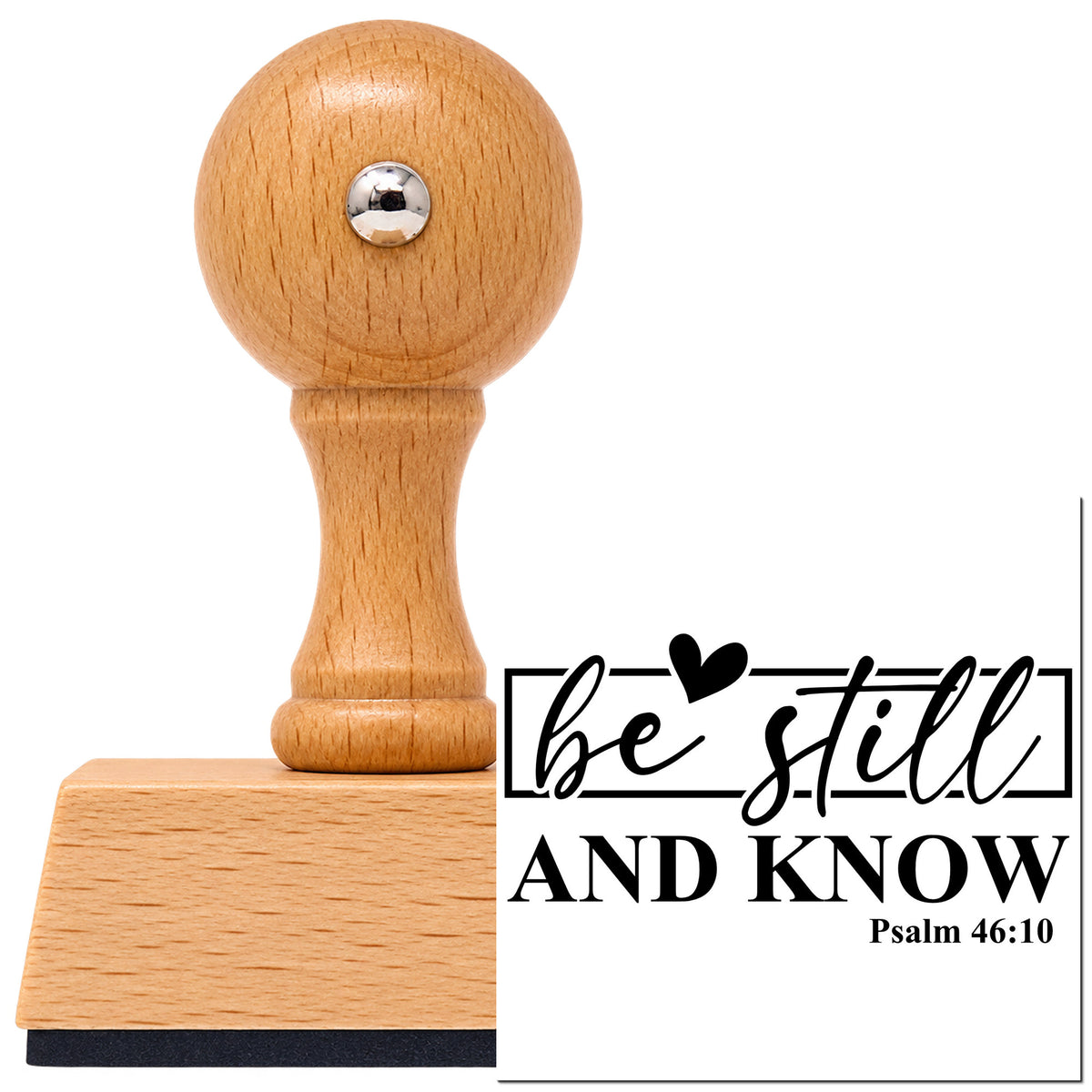 Vintage Pro beech wood stamp with a round knob handle, shown with its black Be Still And Know imprint on white.