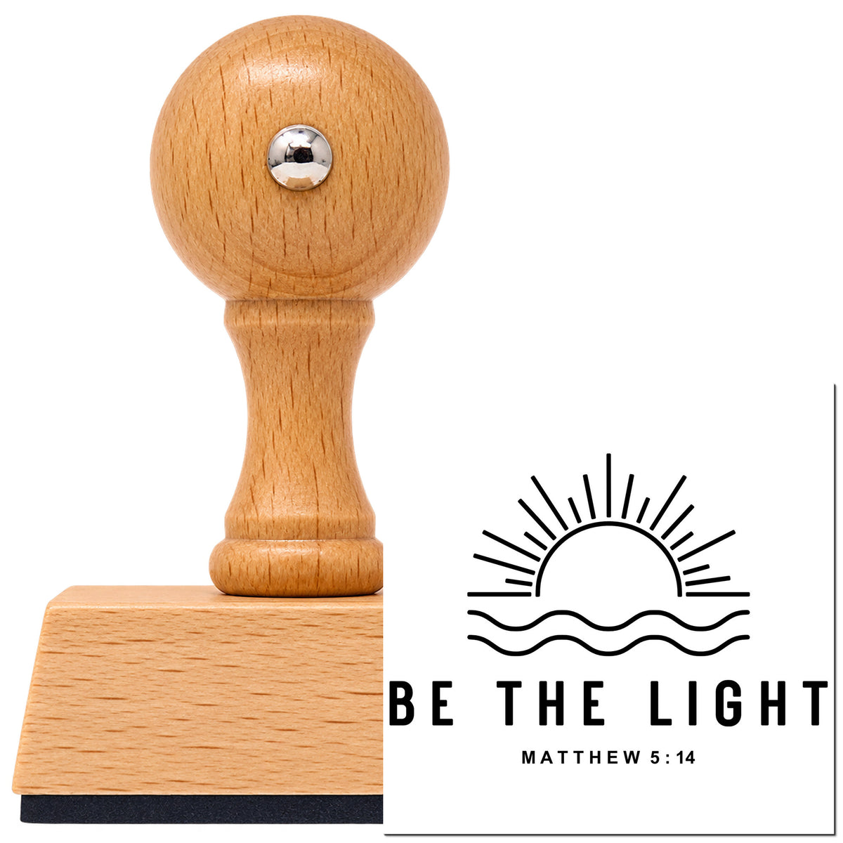 Vintage Pro beech wood stamp with a round knob handle, shown with its black Be The Light Sunrise imprint on white.