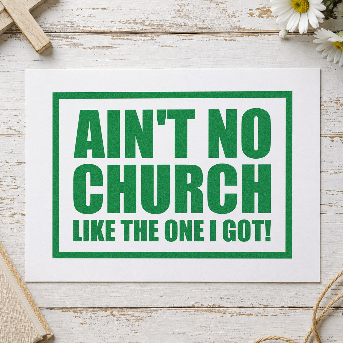 Ain't No Church Block craft stamp imprint in green ink on a handmade project, one idea being picnic signage.