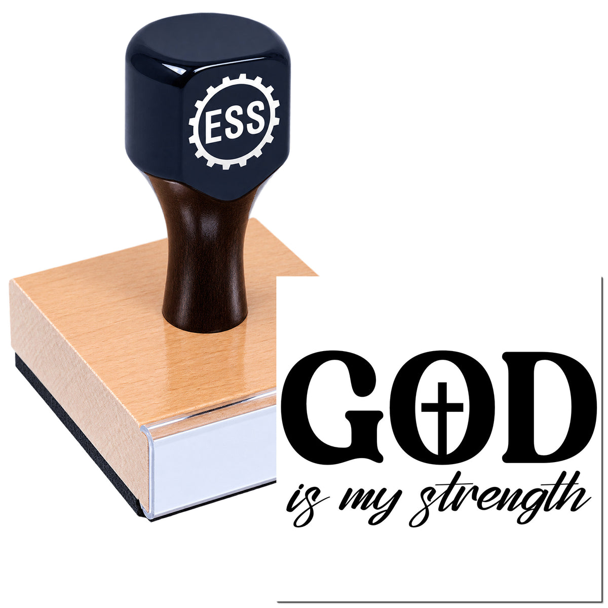 Black ESS stamp and seal on a tan wooden block, featuring "GOD is my strength" in bold black text.