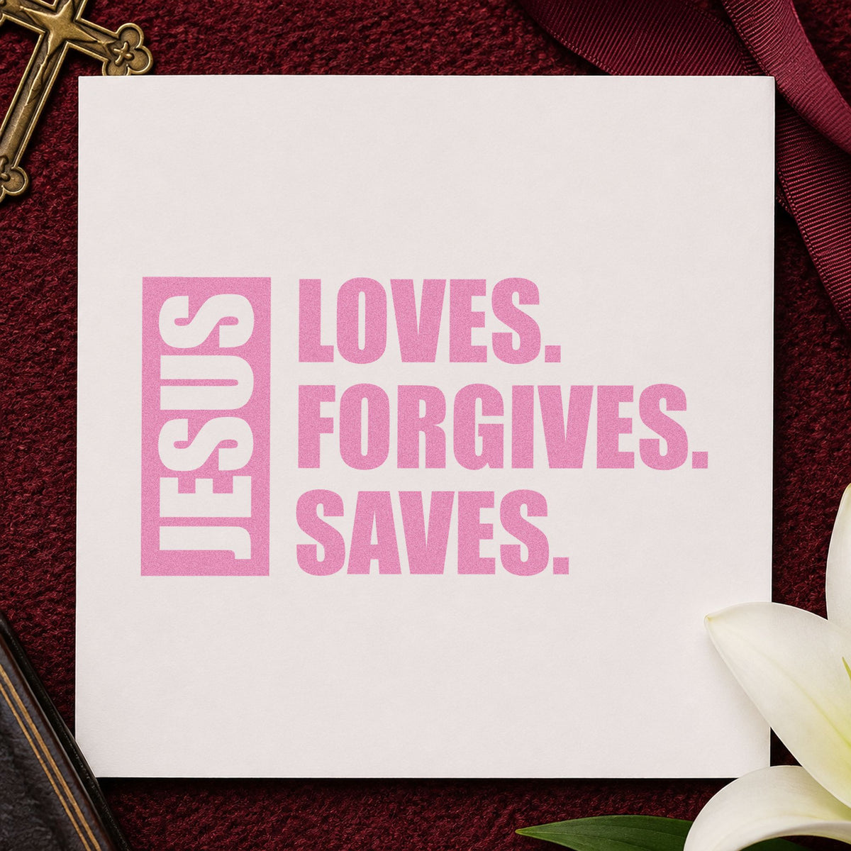Jesus Loves Forgives Saves craft stamp in purple ink on cardstock, an easy option for baptism gifts.