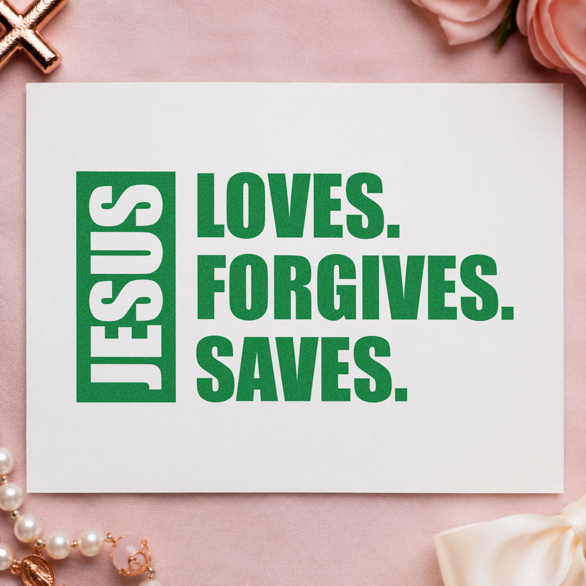 Jesus Loves Forgives Saves craft stamp imprint in green ink on a handmade project, one idea being framed hallway art.