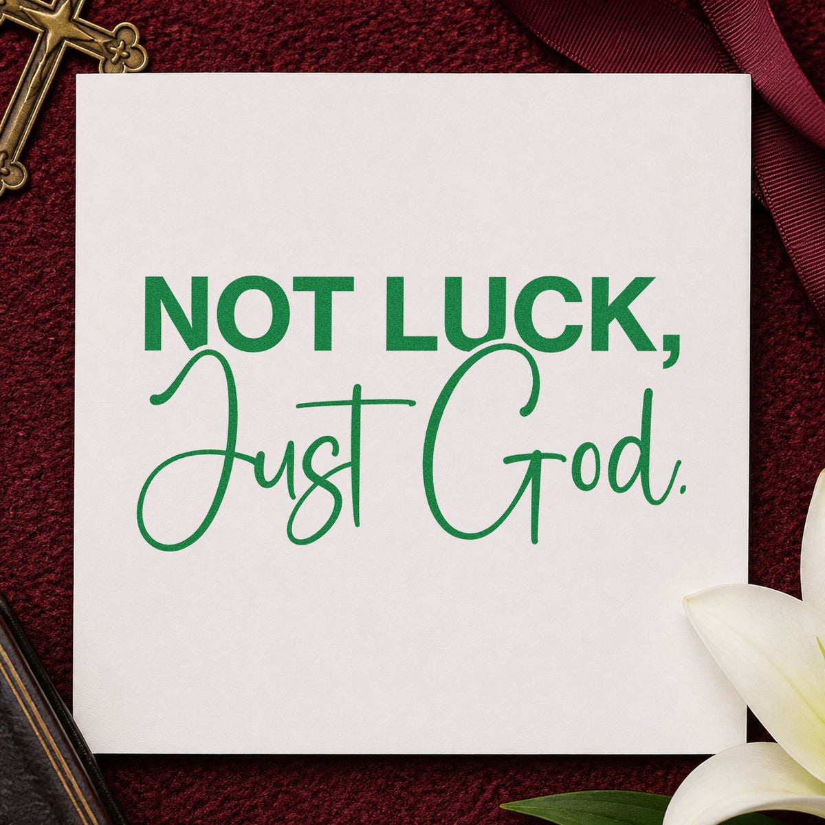 Not Luck Just God craft stamp imprint in green ink on a handmade project, one idea being baby announcements.