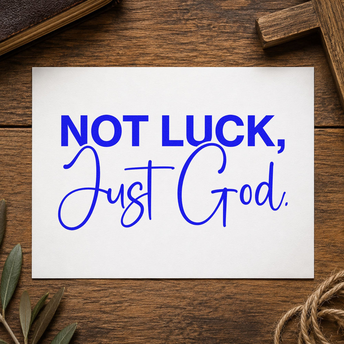 Not Luck Just God craft stamp imprinted in blue ink on paper, a design suited to st. patrick's faith cards.