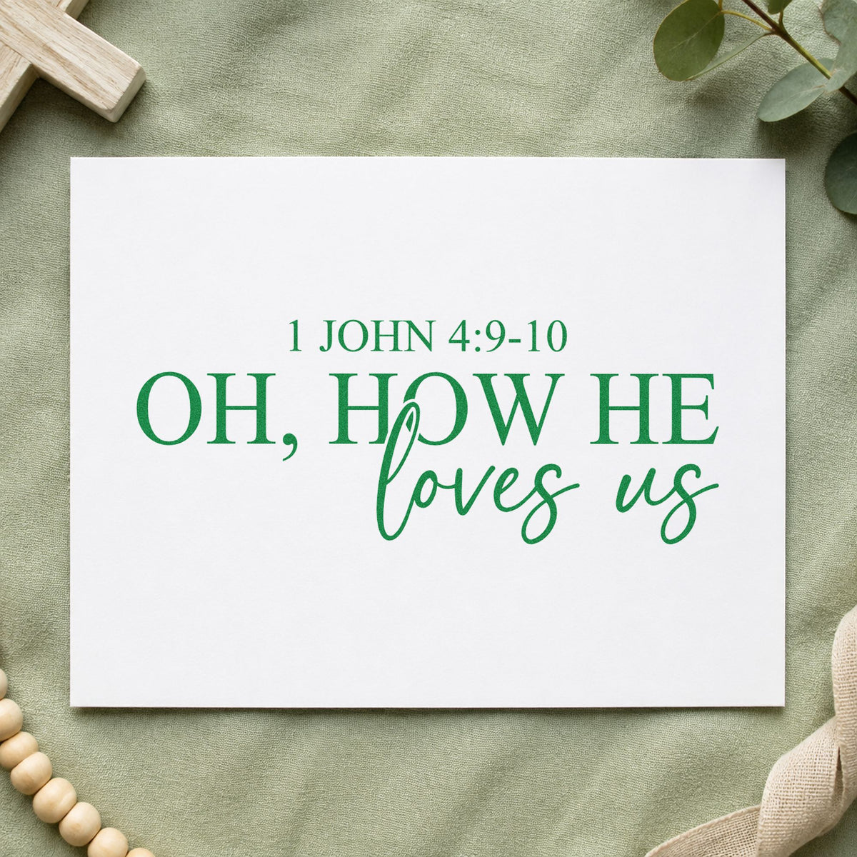 Oh How He Loves Us craft stamp imprint in green ink on a handmade project, one idea being wedding favor tags.