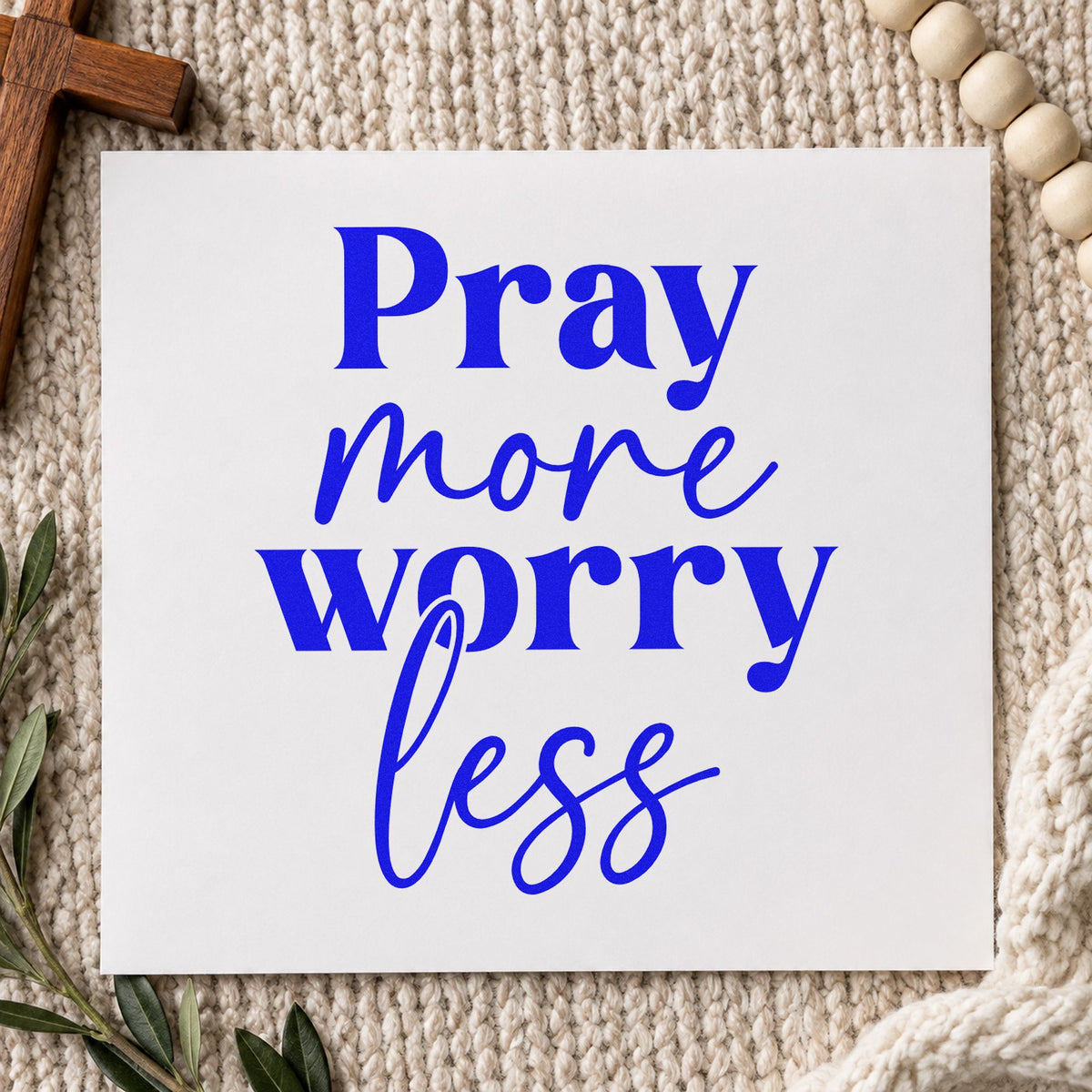 Pray More Worry Less Script craft stamp imprinted in blue ink on paper, a design suited to nurse break room notes.