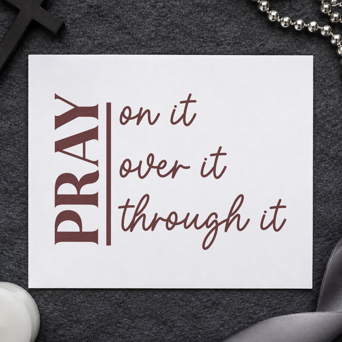 Pray on over Through rubber stamp printed in brown ink, ready for trial scrapbook pages and similar paper crafts.