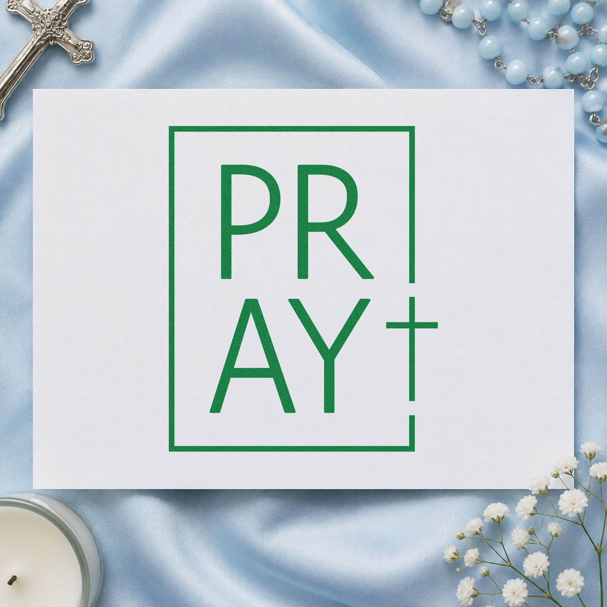 Pray Minimal Cross craft stamp imprint in green ink on a handmade project, one idea being minimalist wall art.