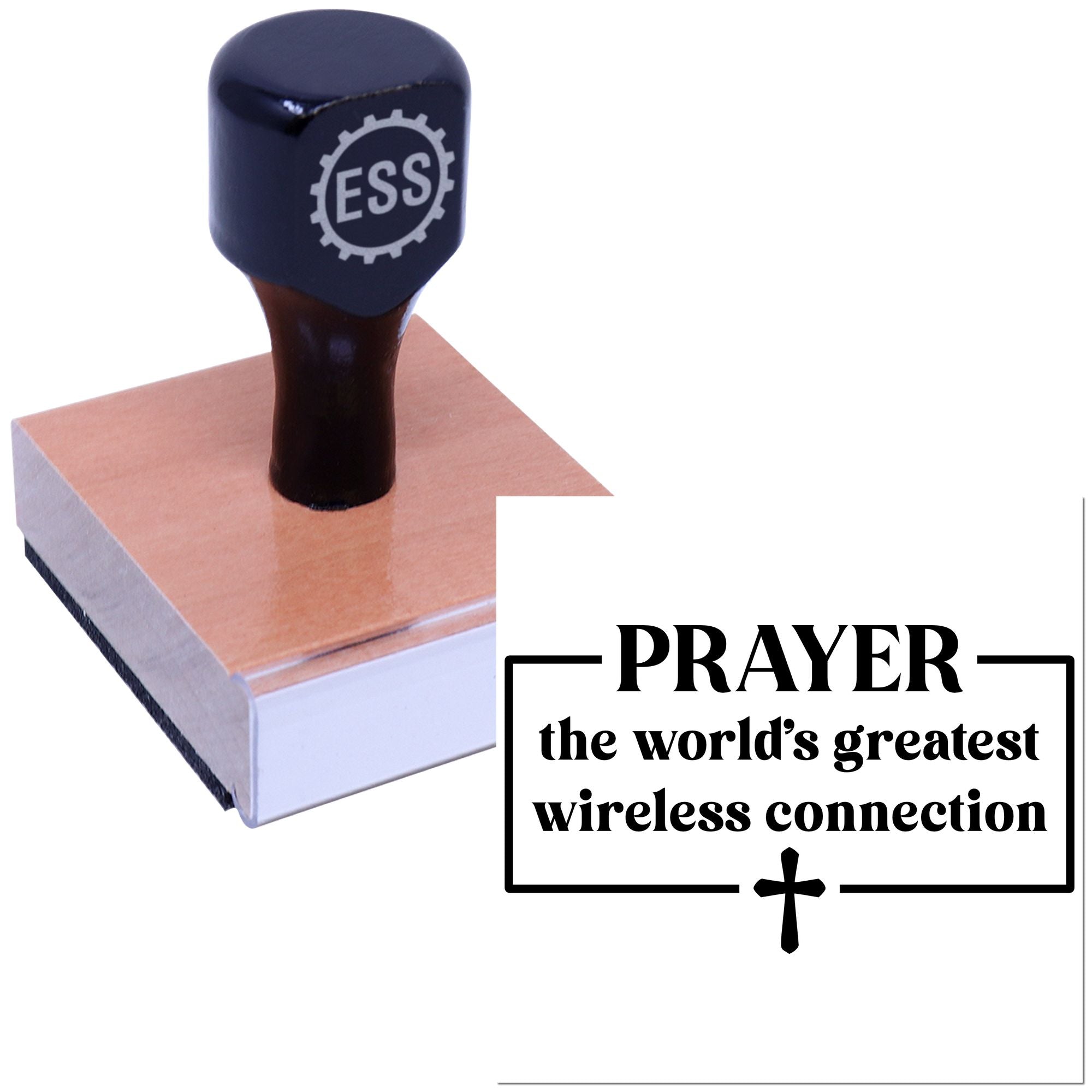 Navy-black ESS stamp seal on wooden block with PRAYER the world's greatest wireless connection and cross symbol.