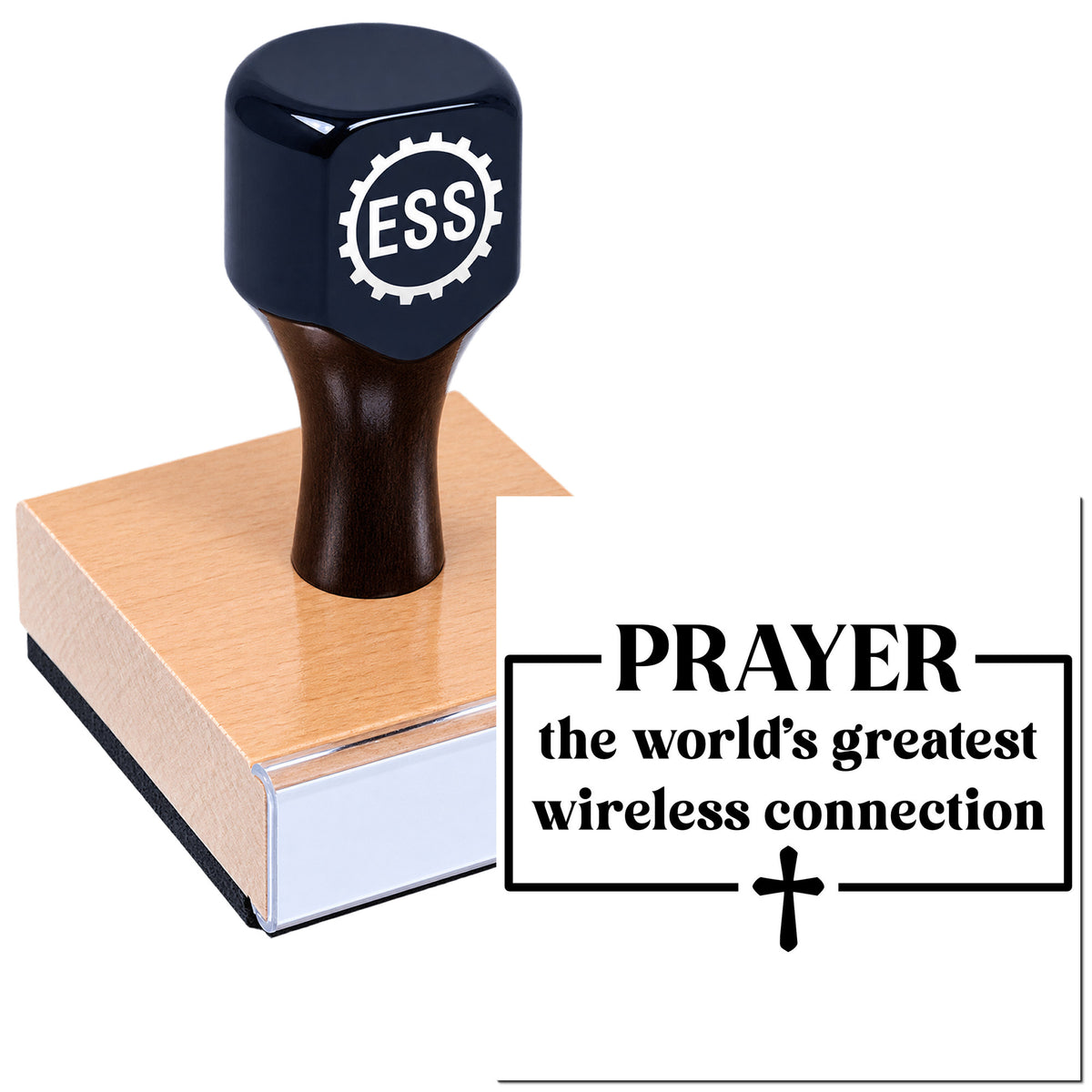 Navy-black ESS stamp seal on wooden block with PRAYER the world's greatest wireless connection and cross symbol.