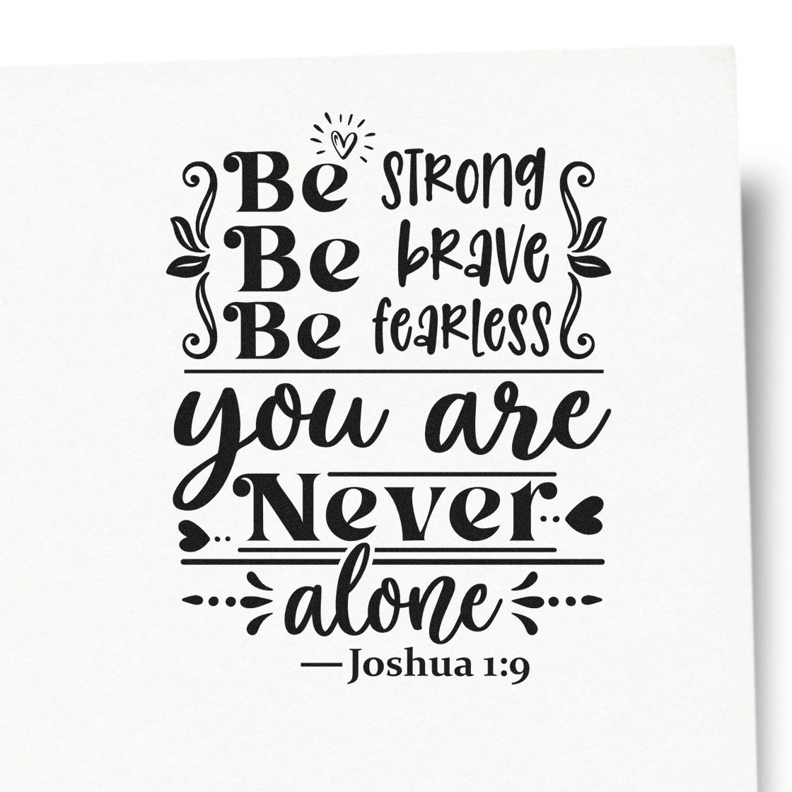 Black decorative stamp/seal design with Bible verse: Be strong, be brave, be fearless. You are never alone on white background.