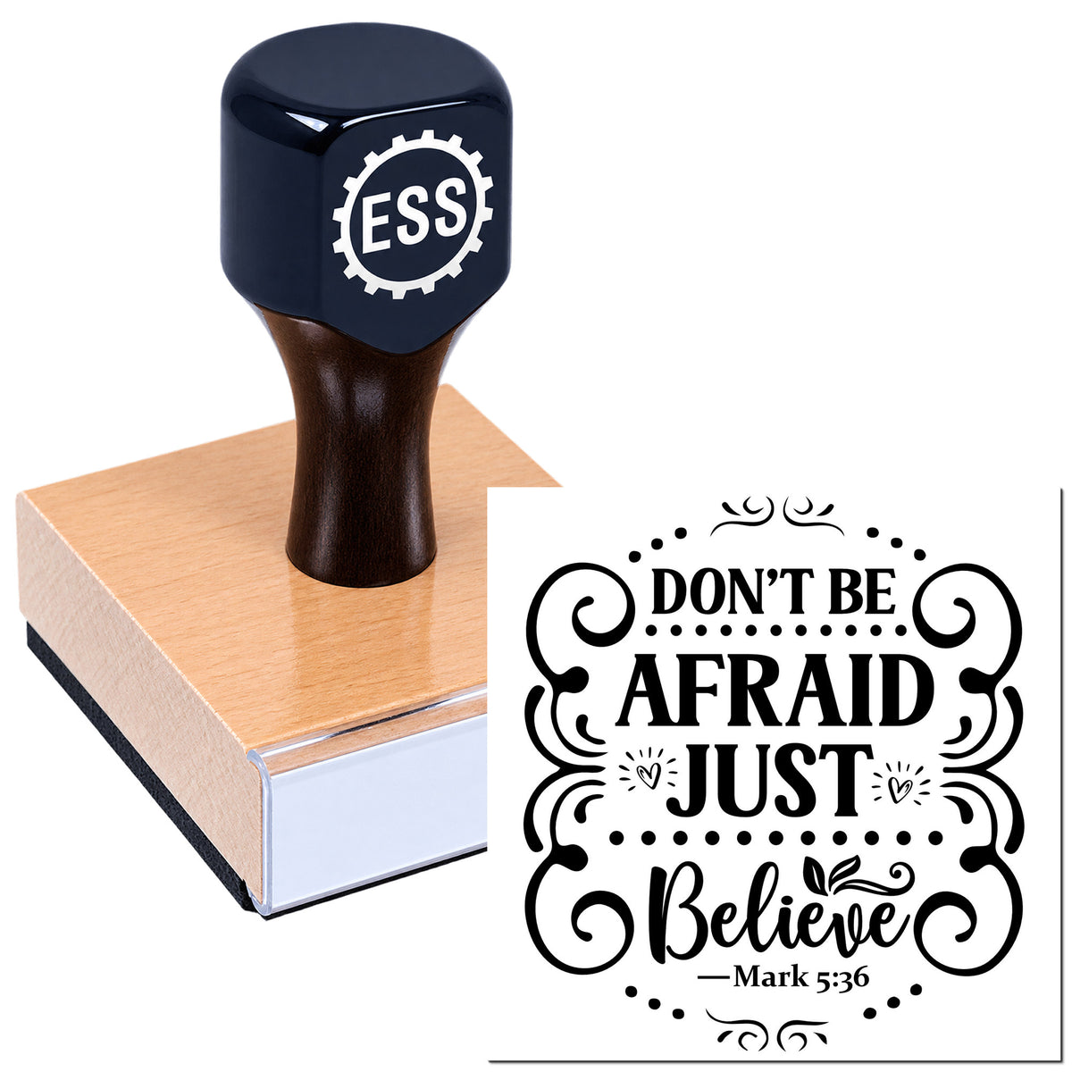 Black ESS stamp on a pink wooden block beside a decorative black seal reading "Don't Be Afraid Just Believe."