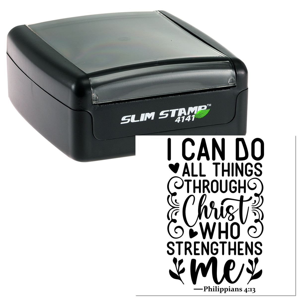 Black slim self-inking stamp and seal with translucent gray lid; sample imprint reads I can do all things through Christ who strengthens me.