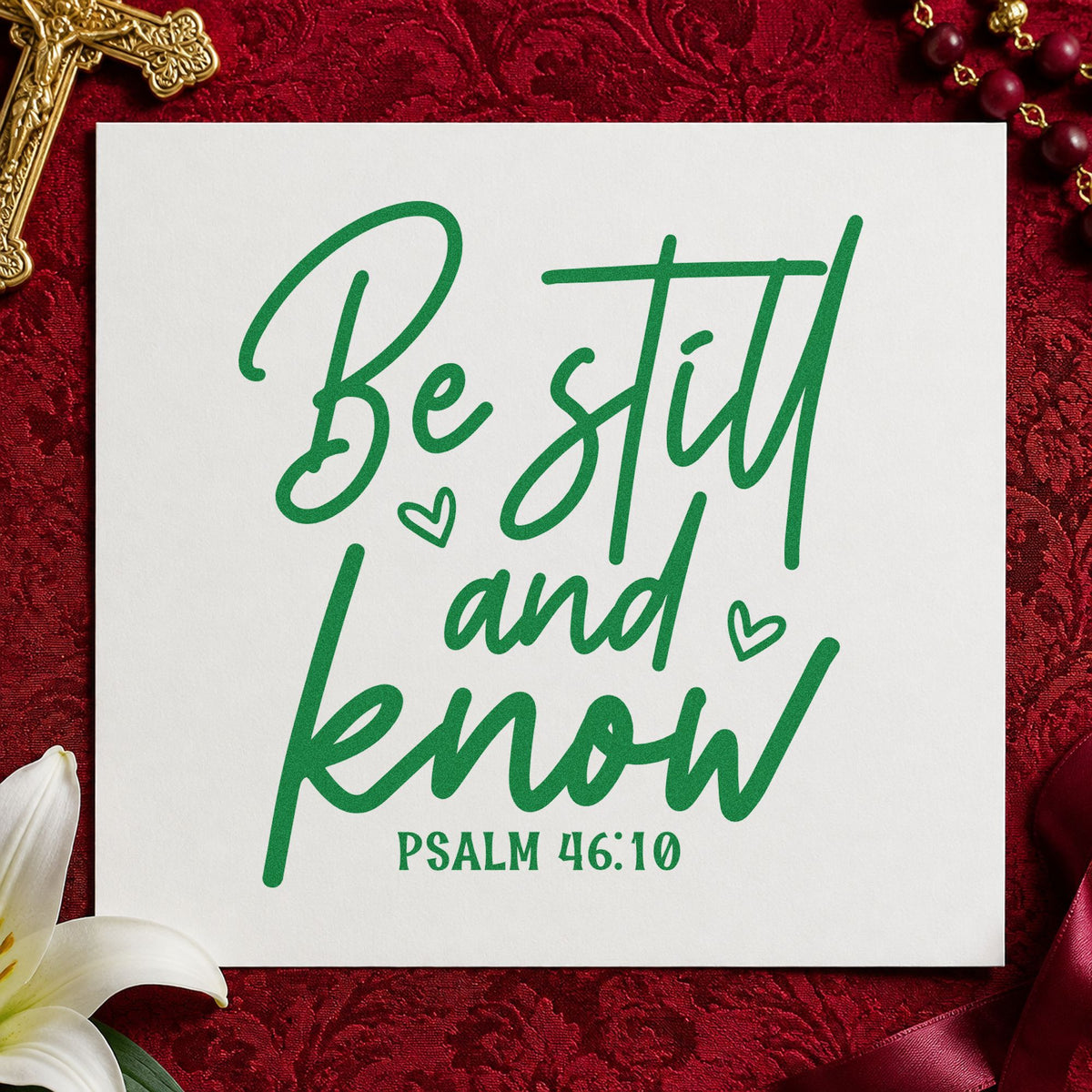 Be Still and Know Script craft stamp imprint in green ink on a handmade project, one idea being framed bedroom art.