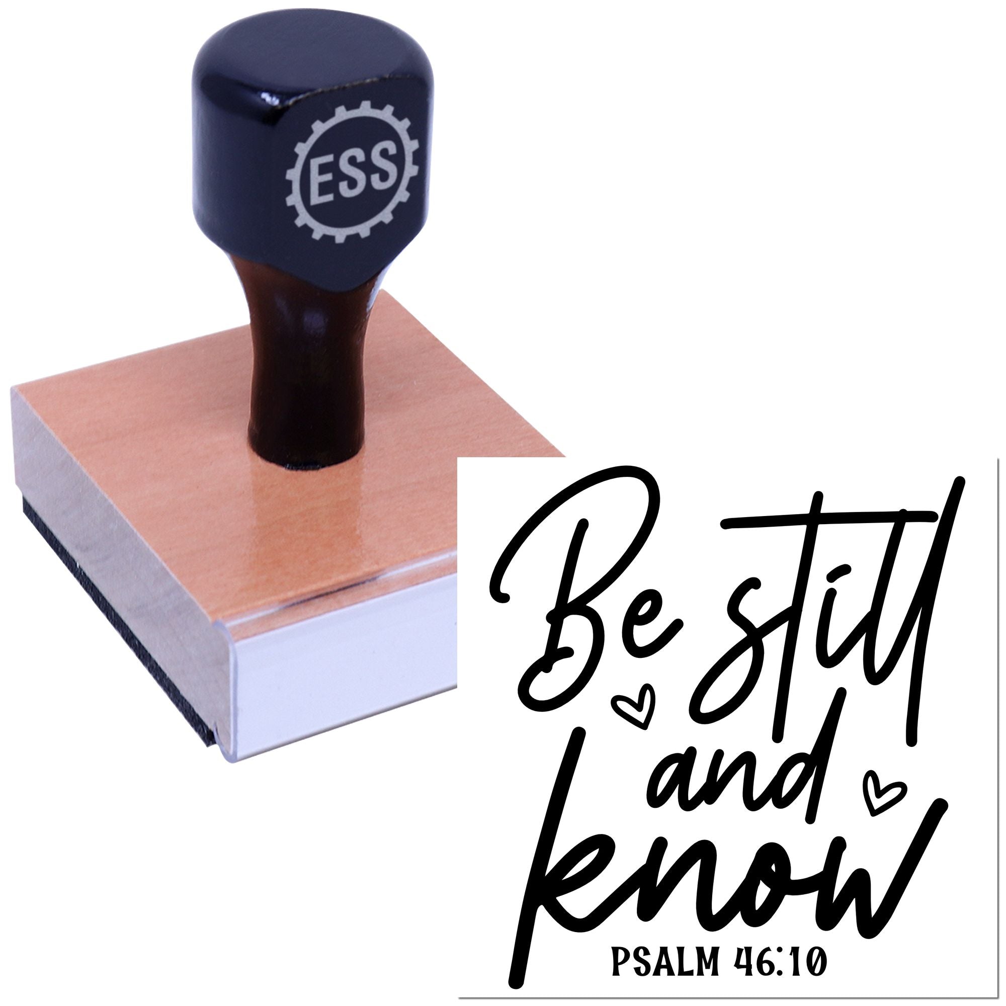 Navy rubber stamp with ESSI gear logo on a wood block beside black Be still and know Psalm 46:10 seal design.