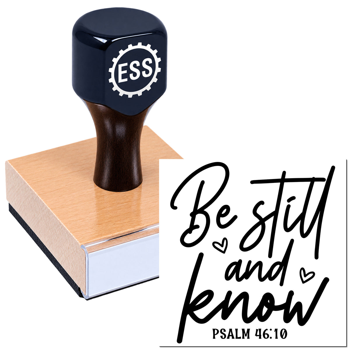 Navy rubber stamp with ESSI gear logo on a wood block beside black "Be still and know" Psalm 46:10 seal design.