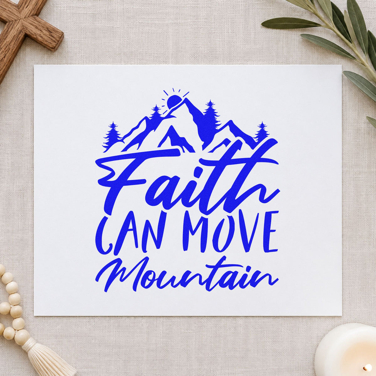Faith Can Move a Mountain craft stamp imprinted in blue ink on paper, a design suited to cabin guest books.
