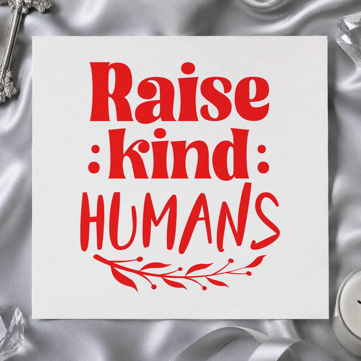 Raise Kind Humans rubber stamp shown in red ink, stamped for projects such as mother's day cards.