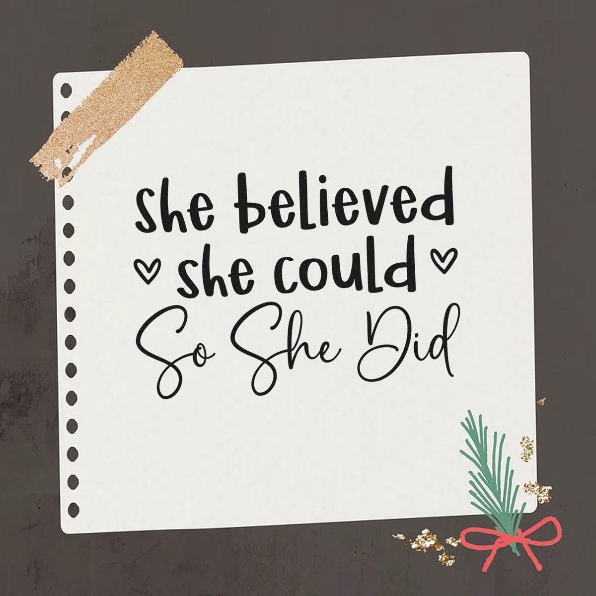 White stamp-and-seal quote card with black She believed she could, so she did lettering, dotted edge, tape, and green-red accents.