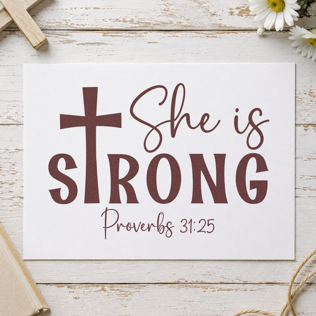 She Is Strong Cross rubber stamp printed in brown ink, ready for tribute scrapbooks and similar paper crafts.