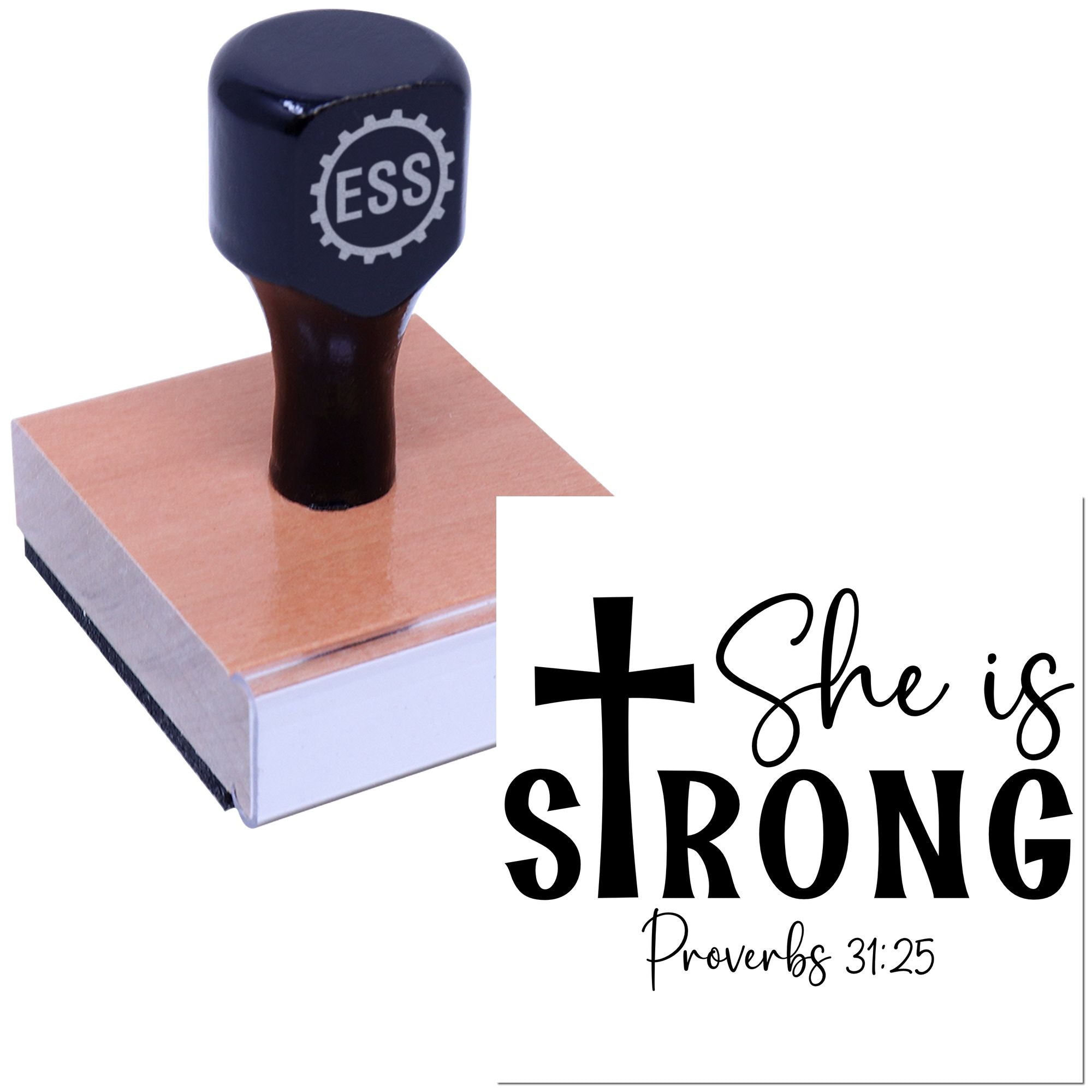 Black self-inking stamp on wooden block with She is Strong Christian seal design, cross, and Proverbs 31:25 on white background.