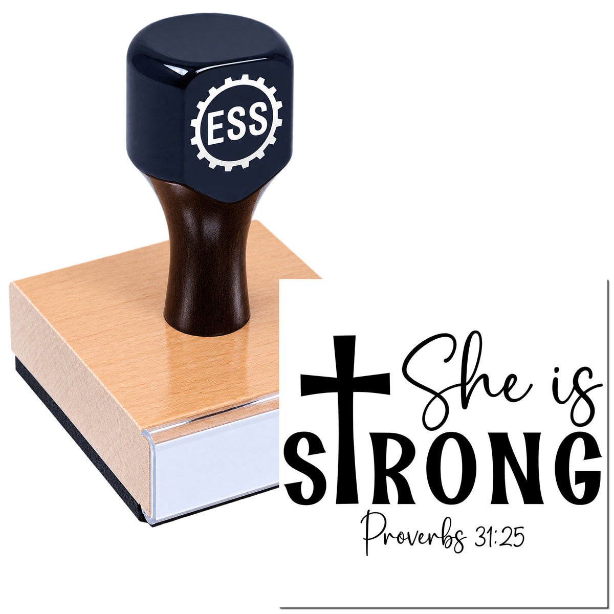 Black self-inking stamp on wooden block with "She is Strong" Christian seal design, cross, and Proverbs 31:25 on white background.