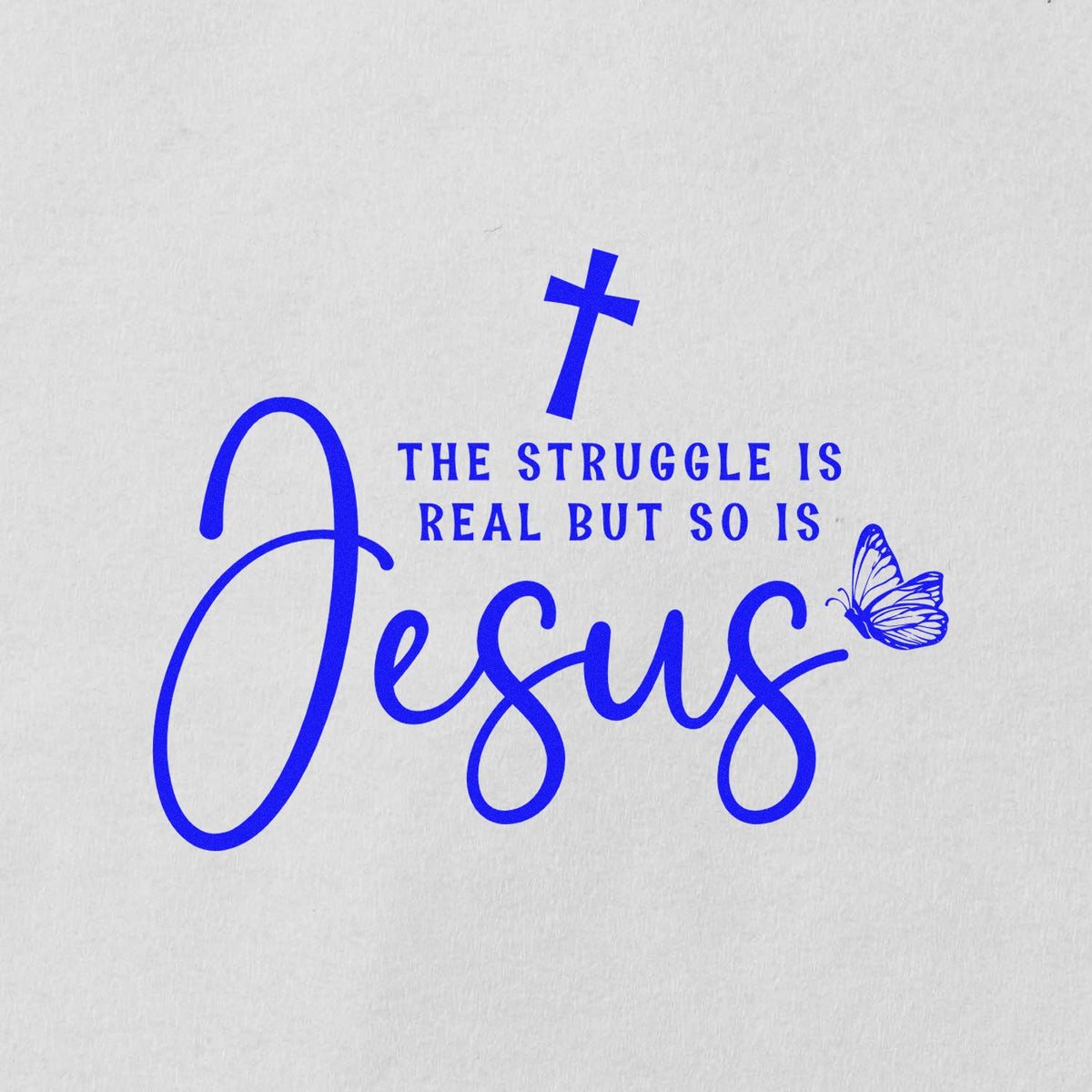 Blue religious stamp seal on white paper with cross, butterfly, and text: The struggle is real but so is Jesus.