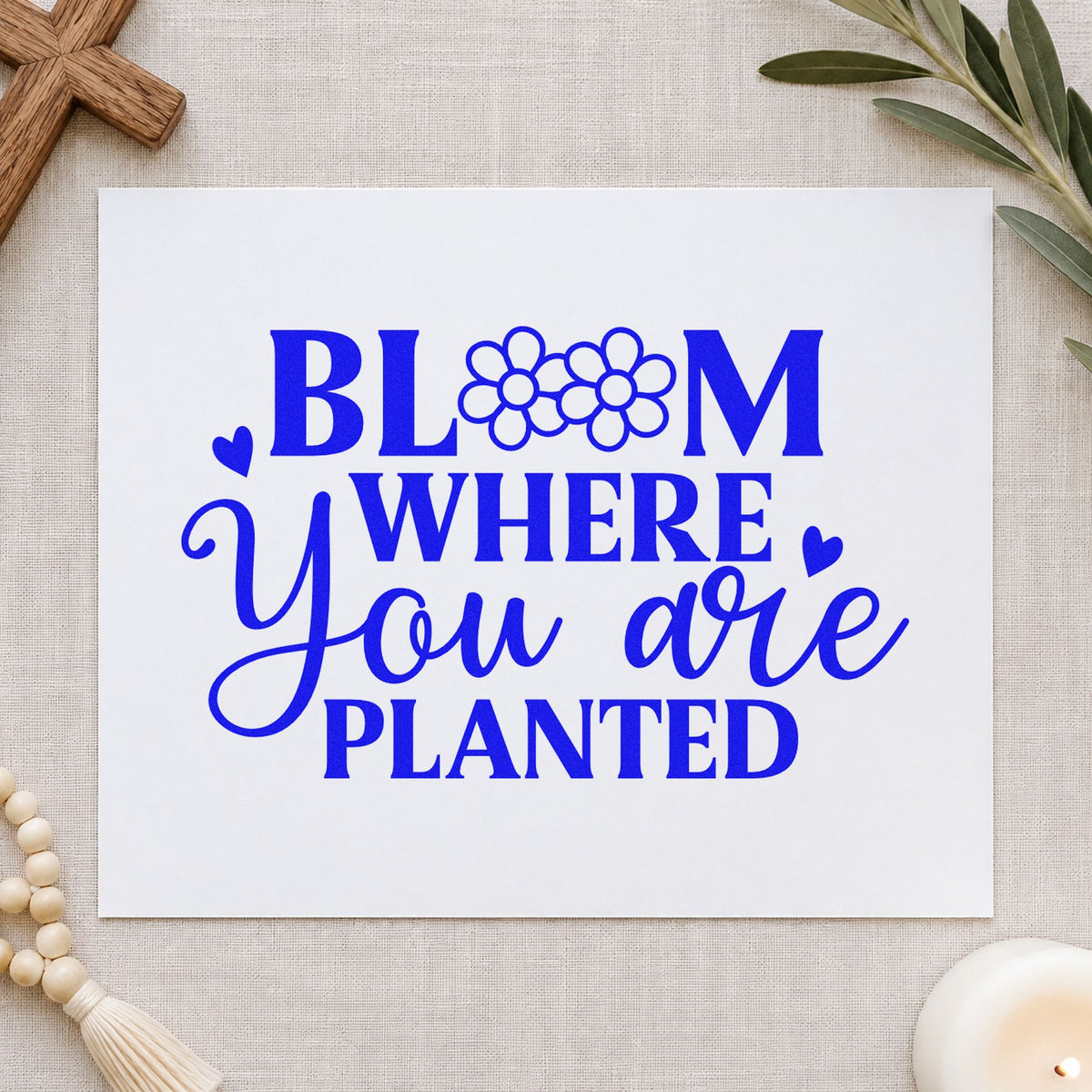 Bloom Where You Are Planted craft stamp imprinted in blue ink on paper, a design suited to new home pages.