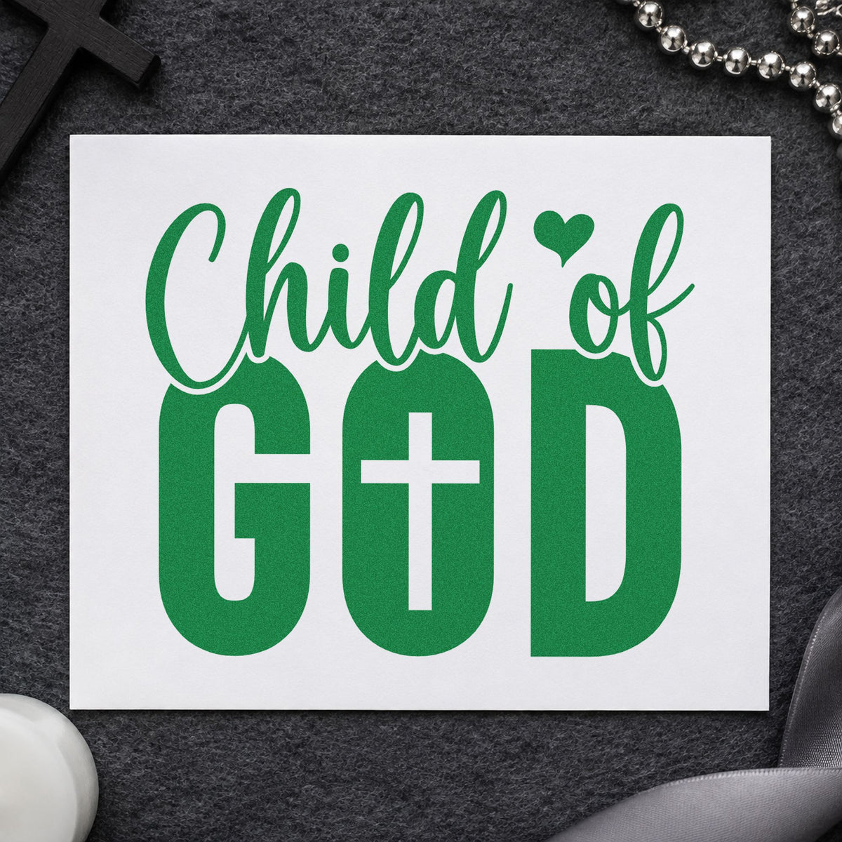 Child of God craft stamp imprint in green ink on a handmade project, one idea being lunchbox notes.