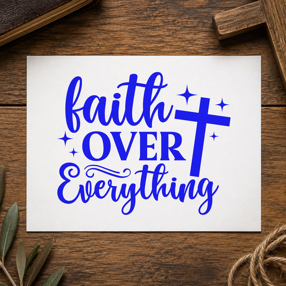 Faith over Everything craft stamp imprinted in blue ink on paper, a design suited to locker signs.
