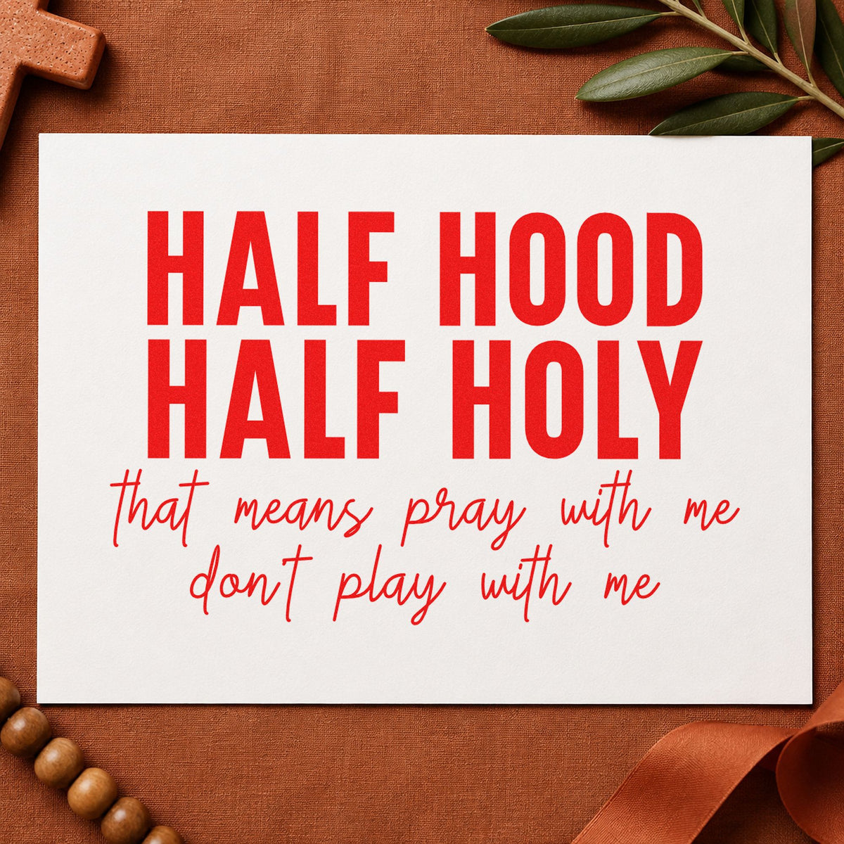 Half Hood Half Holy rubber stamp shown in red ink, stamped for projects such as fridge magnets.
