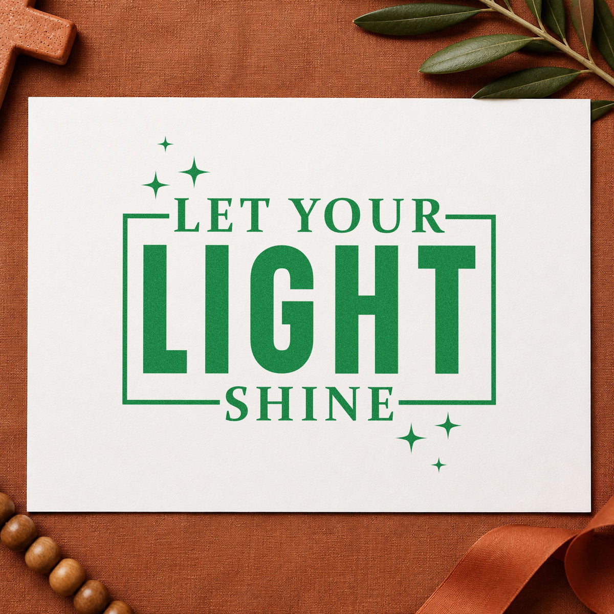 Let Your Light Shine craft stamp imprint in green ink on a handmade project, one idea being volunteer thank-yous.
