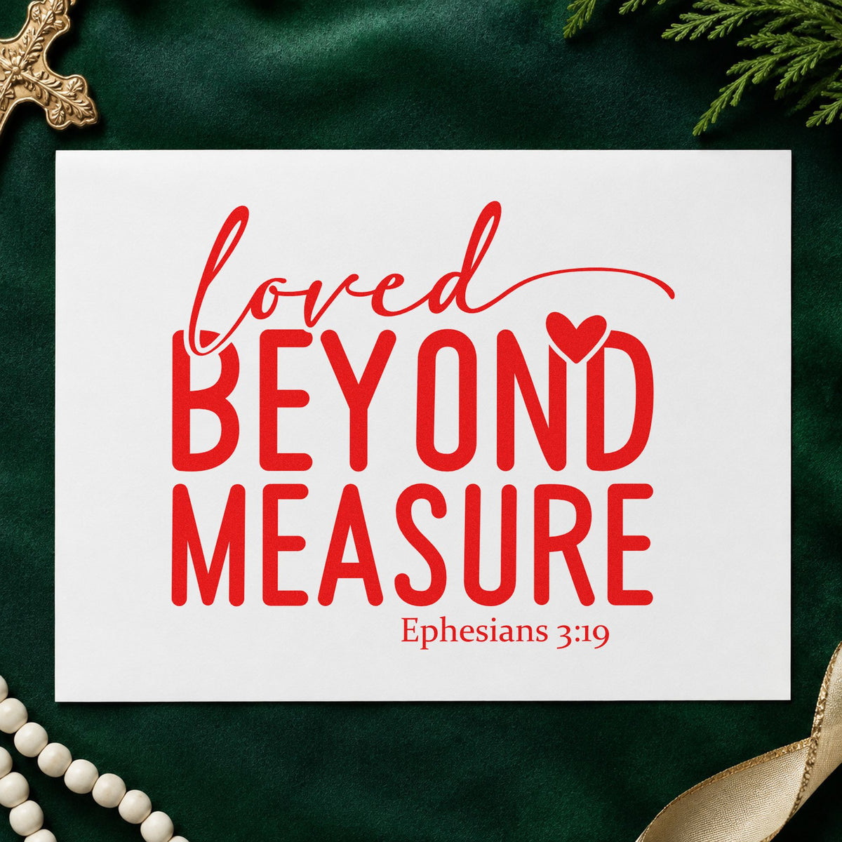 Loved Beyond Measure rubber stamp shown in red ink, stamped for projects such as baby book openers.