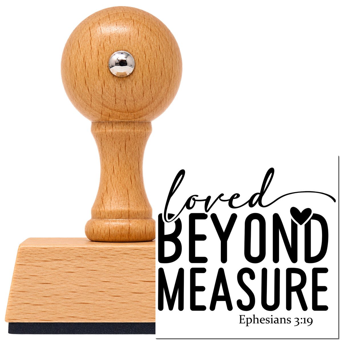Vintage Pro beech wood stamp with a round knob handle, shown with its black Loved Beyond Measure imprint on white.