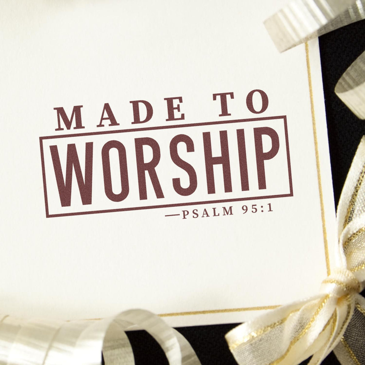 Cream stamp and seal card with burgundy Made to Worship text, Psalm 95:1, and gold ribbon accents.
