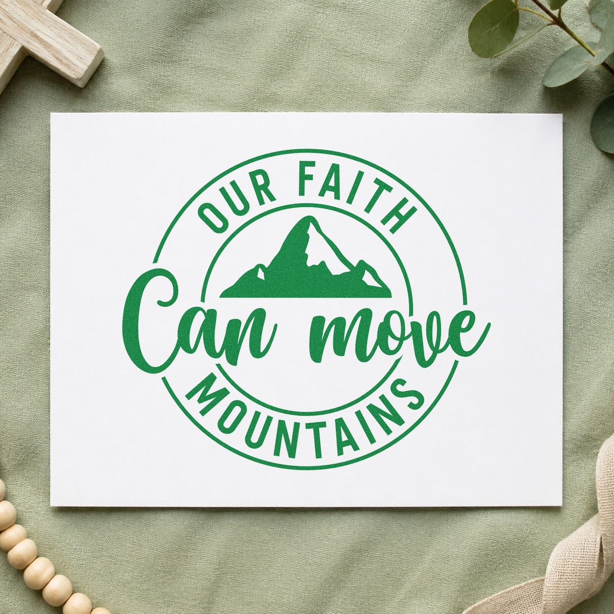 Faith Can Move Mountains craft stamp imprint in green ink on a handmade project, one idea being team tees.