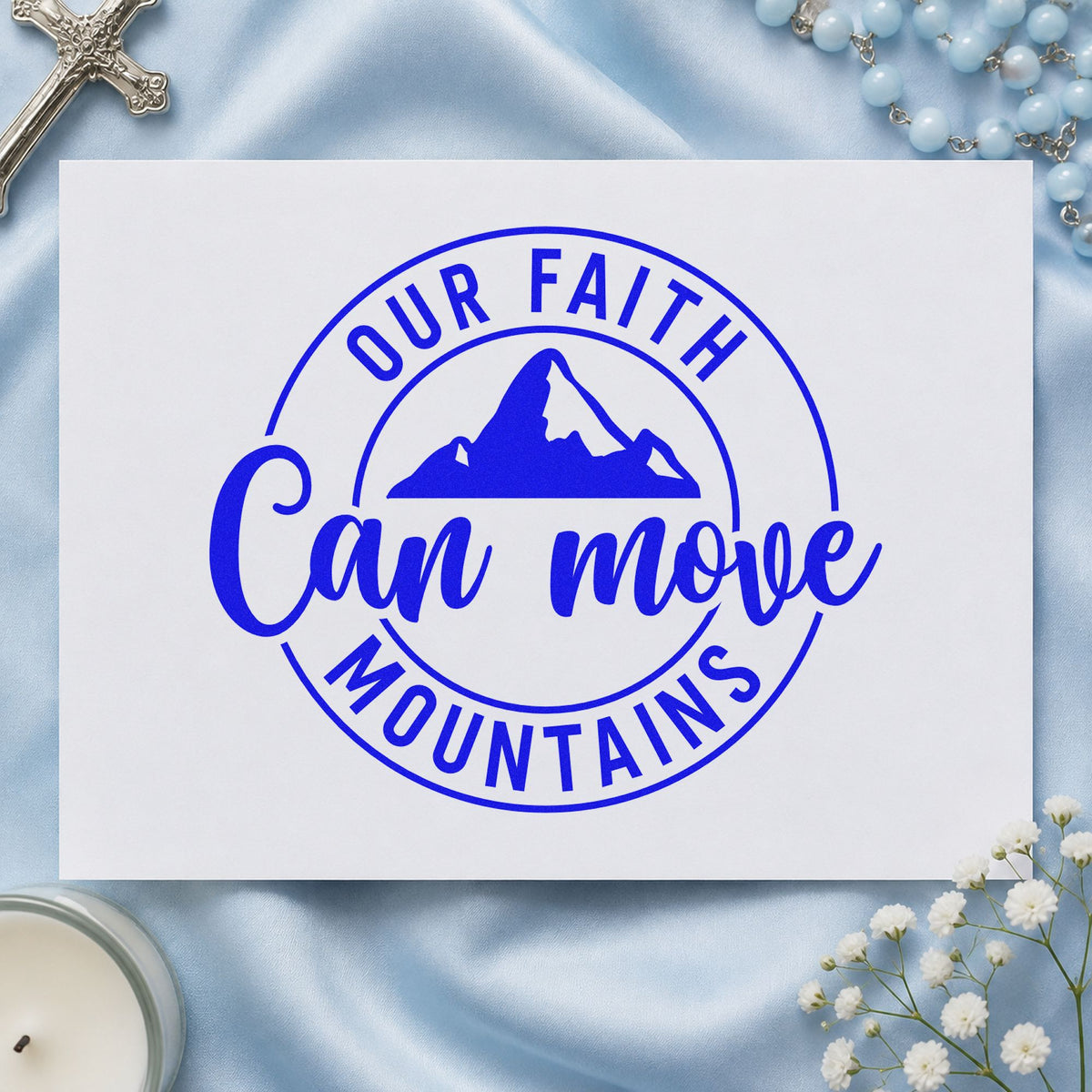 Faith Can Move Mountains craft stamp imprinted in blue ink on paper, a design suited to coasters.