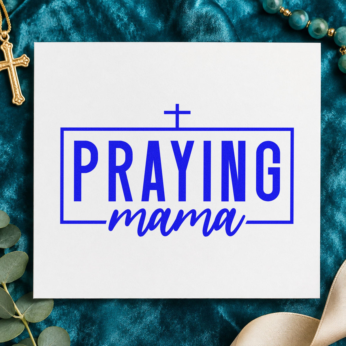 Praying Mama craft stamp imprinted in blue ink on paper, a design suited to ladies' group favors.