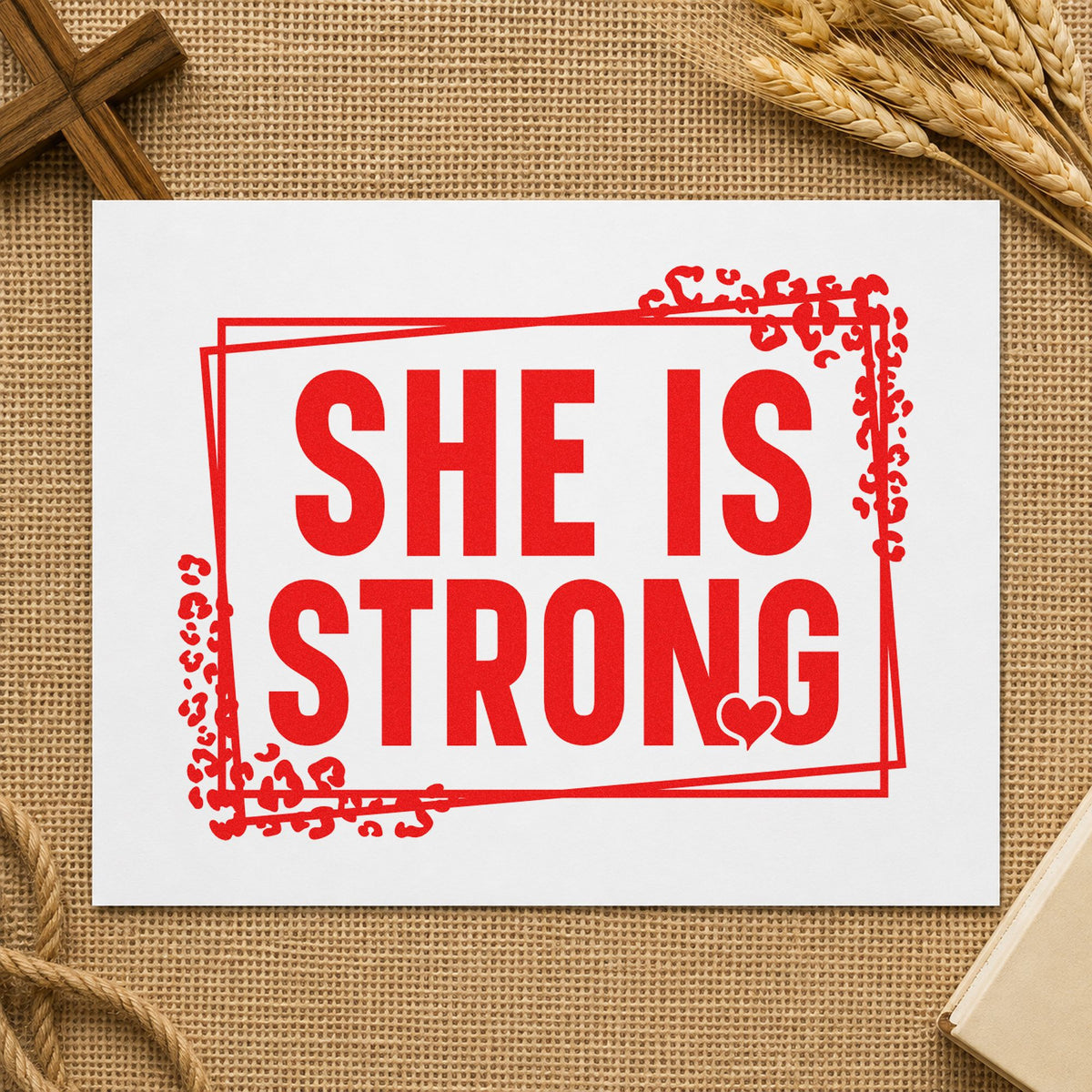 She Is Strong rubber stamp shown in red ink, stamped for projects such as girls' room art.