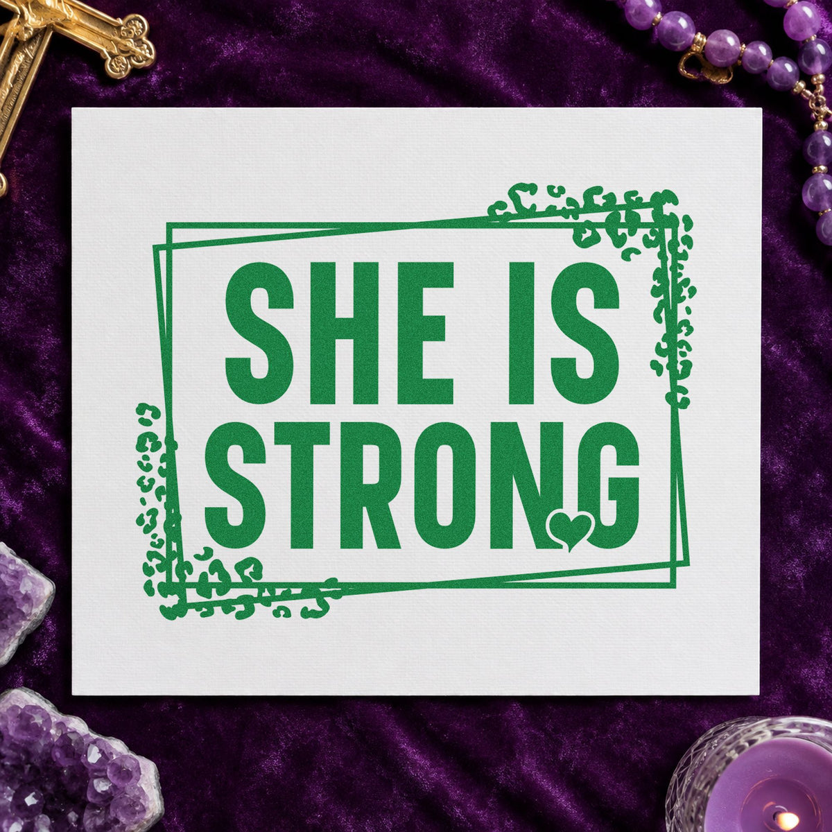 She Is Strong craft stamp imprint in green ink on a handmade project, one idea being retreat name tags.