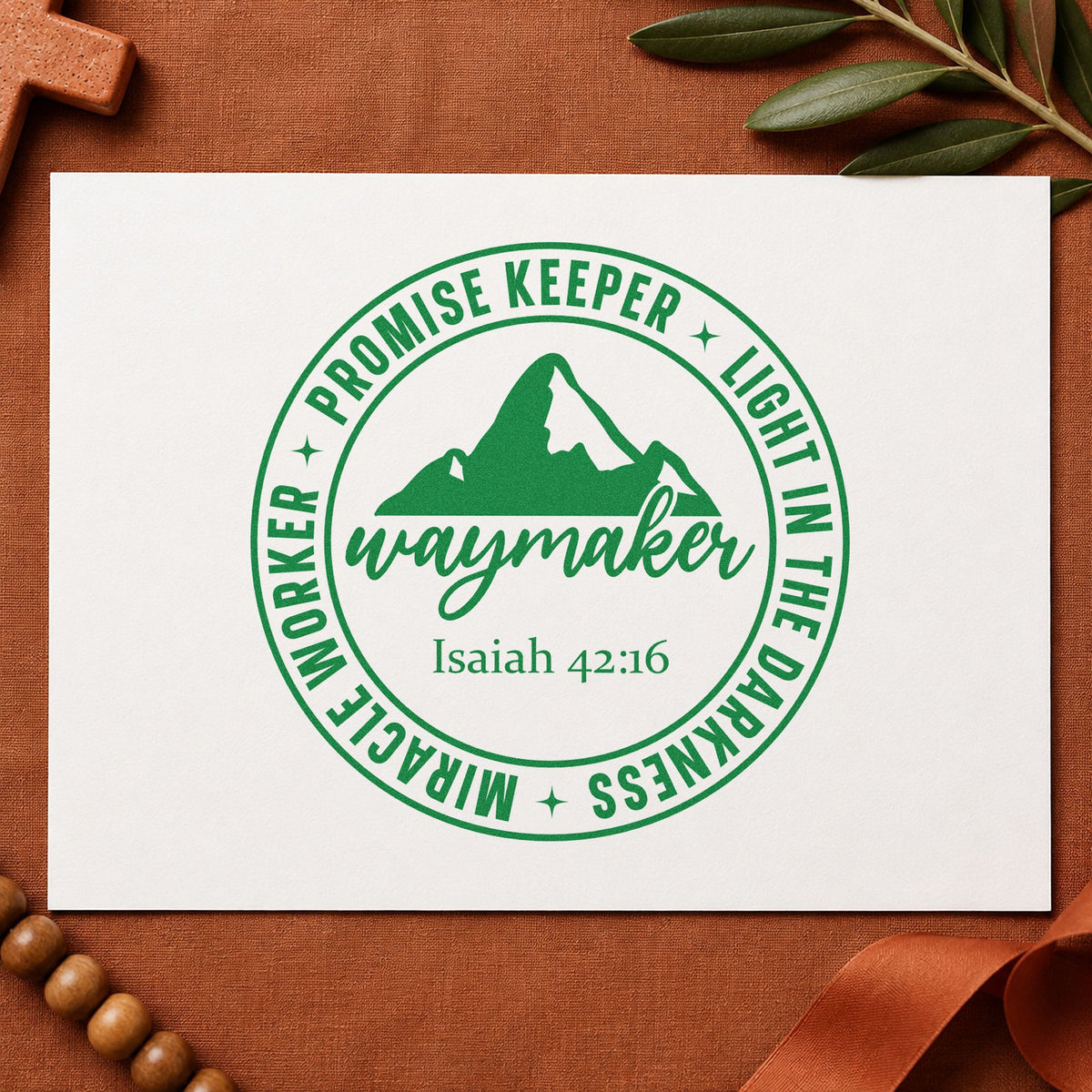 Waymaker Mountain Badge craft stamp imprint in green ink on a handmade project, one idea being hiking group gifts.