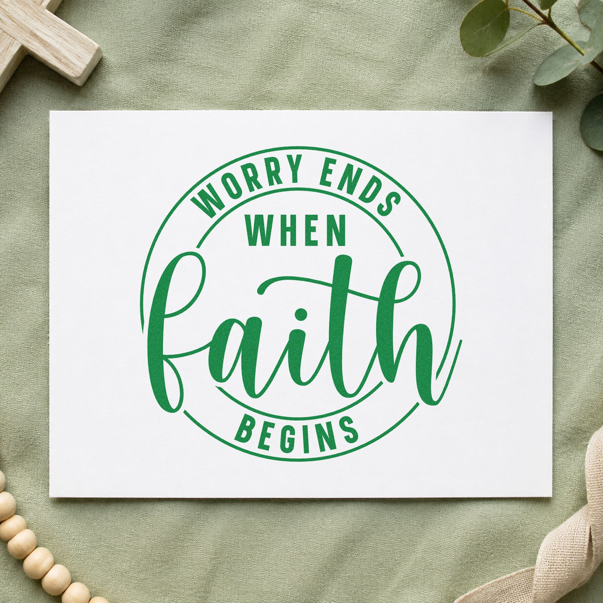 Worry Ends When Faith Begins craft stamp imprint in green ink on a handmade project, one idea being framed bedroom art.